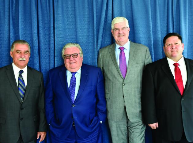 From left, BAC Executive Vice President Gerard Scarano, President James Boland, Secretary-Treasurer Tim Driscoll, and Executive Vice President Carlos Aquin.